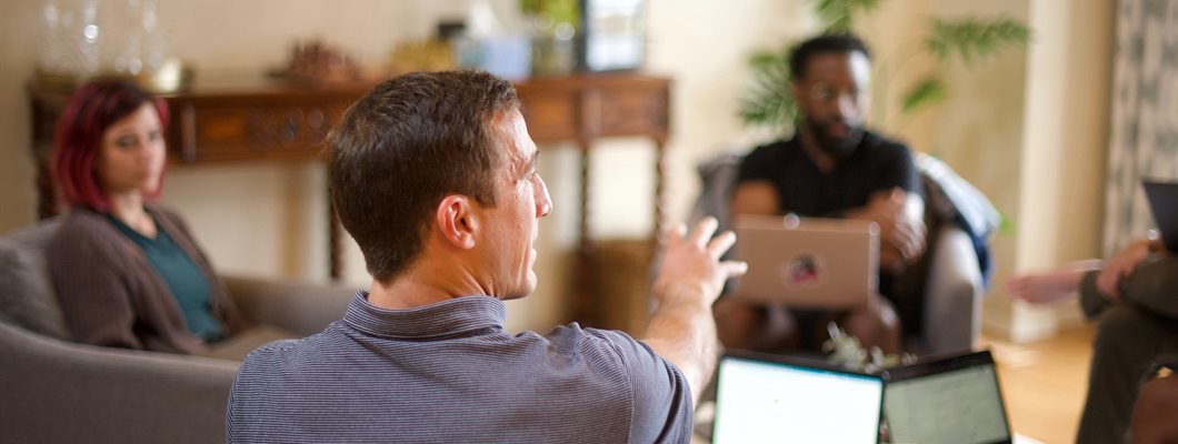 A group of 4-5 people 'working from home'